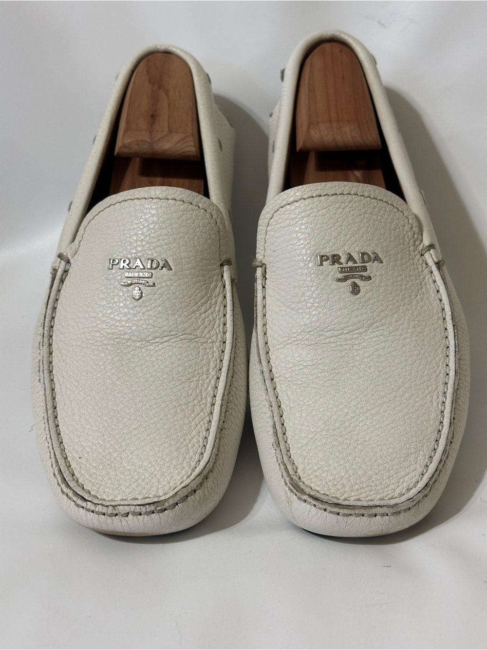 Prada White Pebbled Leather Slip-On Loafers